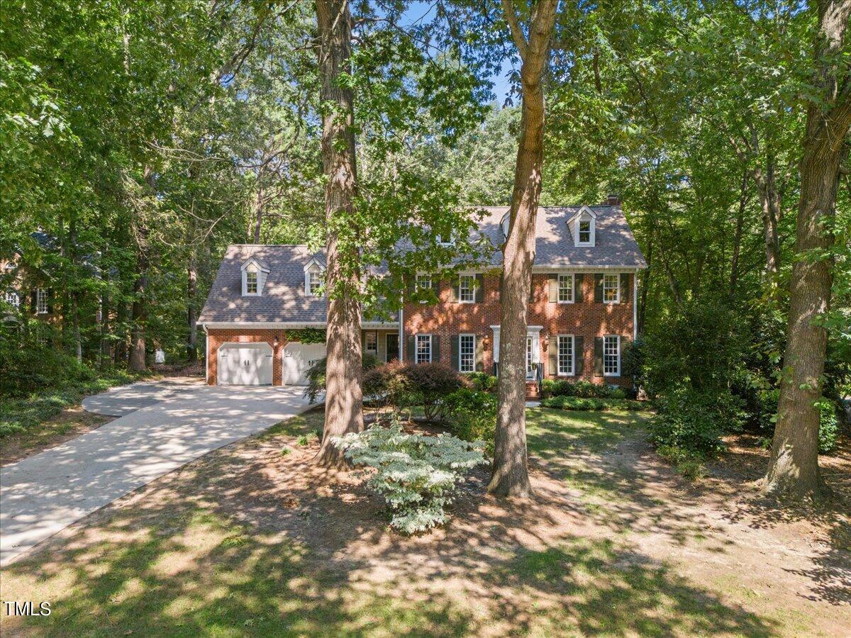 10036 Old Warden Road Raleigh, NC 27615 - Photo 42 of 42 a house view with a outdoor space