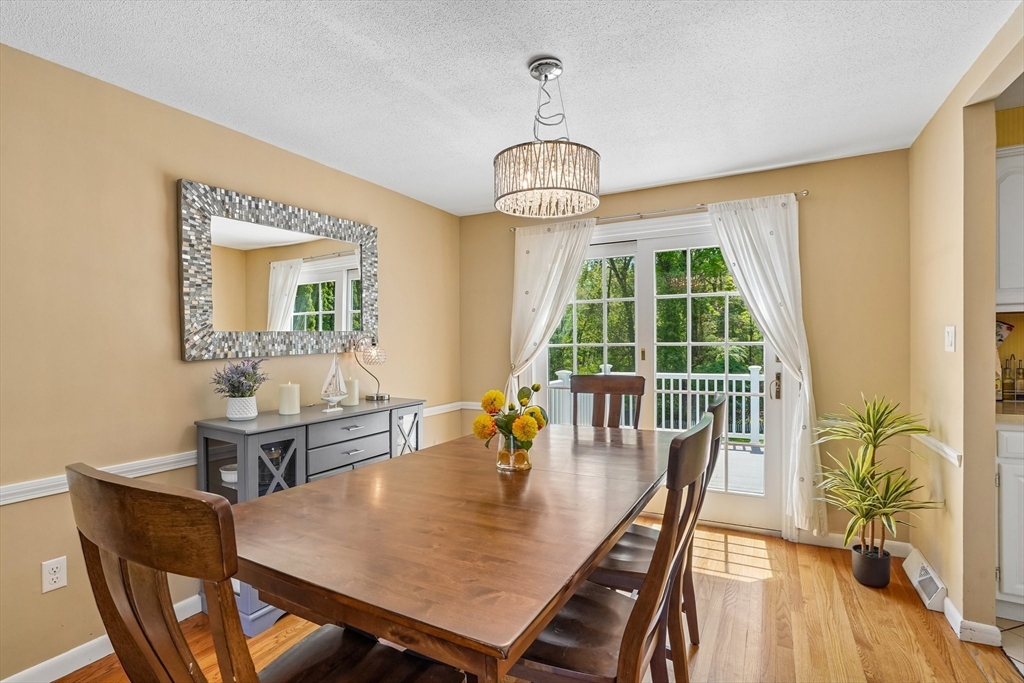 35 Westgate Road Framingham, MA 01701 - Photo 9 of 37 a view of a dining room with furniture window and outside view