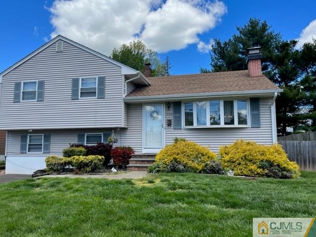 730 Lawrence Road Bound Brook, NJ 08805 - Photo 1 of 23 a front view of a house with garden