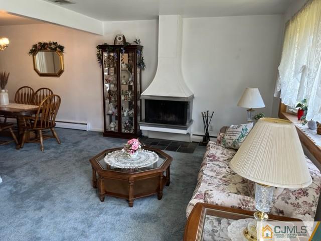 730 Lawrence Road Bound Brook, NJ 08805 - Photo 11 of 23 a living room with furniture and a fireplace