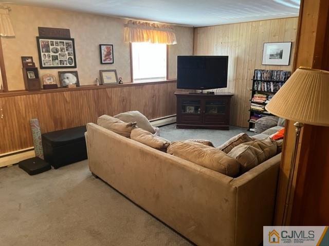 730 Lawrence Road Bound Brook, NJ 08805 - Photo 13 of 23 a living room with furniture and a flat screen tv