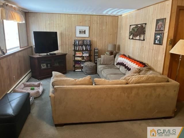 730 Lawrence Road Bound Brook, NJ 08805 - Photo 14 of 23 a living room with furniture and a flat screen tv