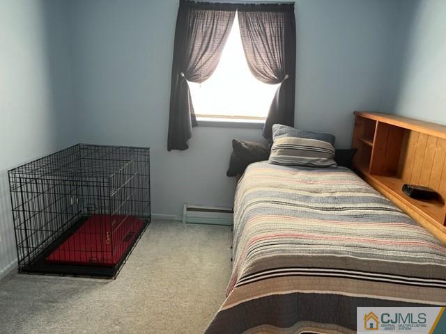 730 Lawrence Road Bound Brook, NJ 08805 - Photo 19 of 23 a bedroom with a bed and window