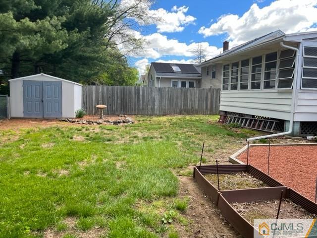 730 Lawrence Road Bound Brook, NJ 08805 - Photo 21 of 23 a backyard of a house with table and chairs