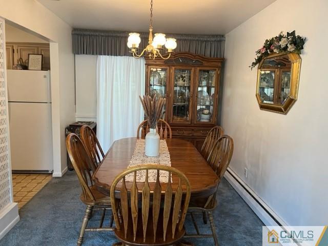 730 Lawrence Road Bound Brook, NJ 08805 - Photo 7 of 23 a view of a dining room with furniture and chandelier