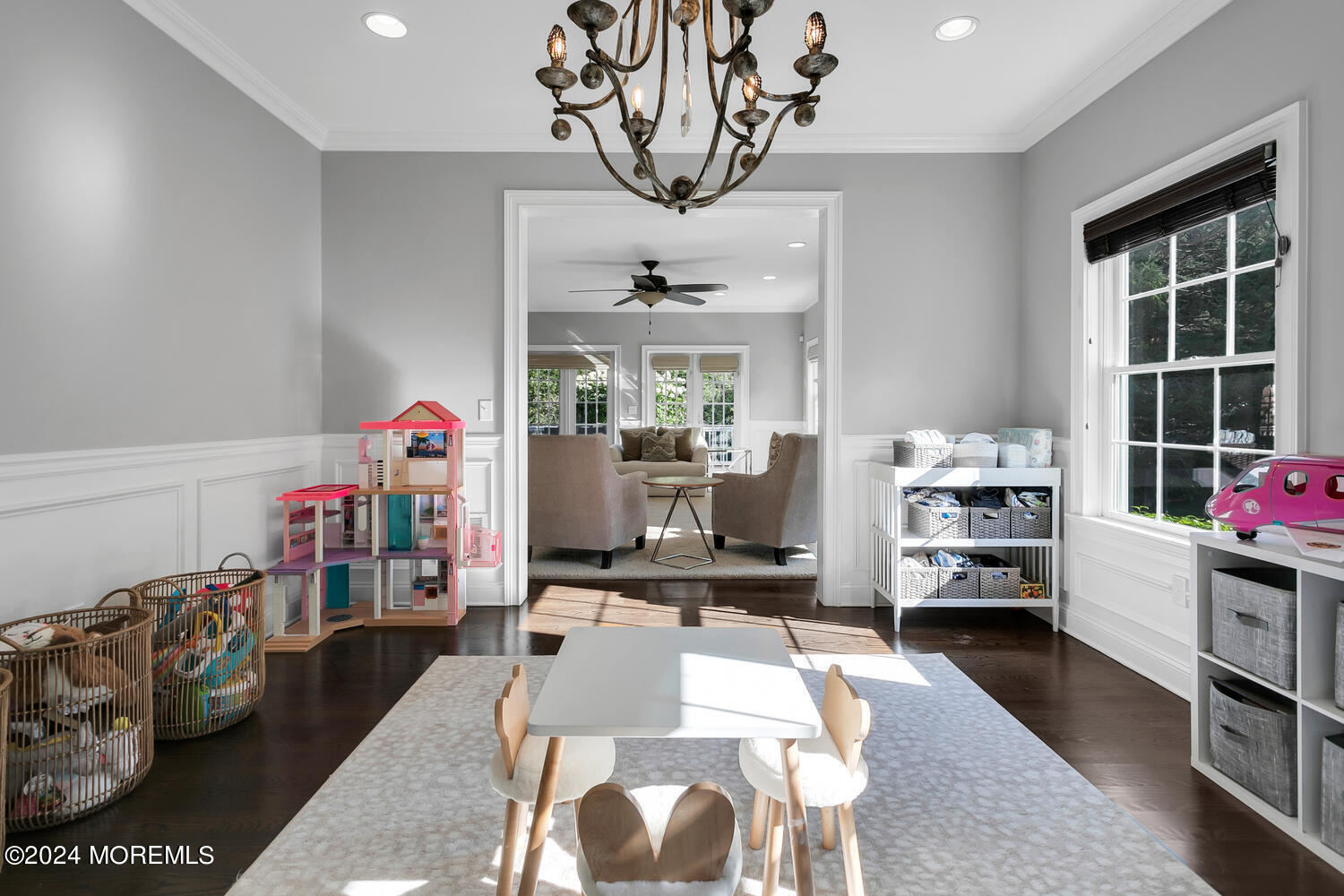 19 Old Phalanx Road Lincroft, NJ 07738 - Photo 19 of 68 a living room with furniture a window and gym equipment