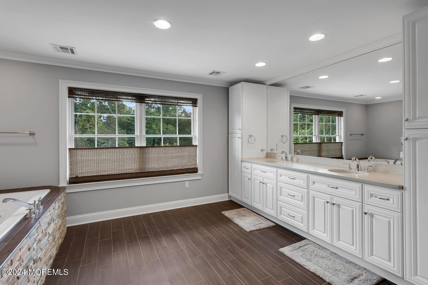 19 Old Phalanx Road Lincroft, NJ 07738 - Photo 29 of 68 a large bathroom with a large mirror vanity and sink