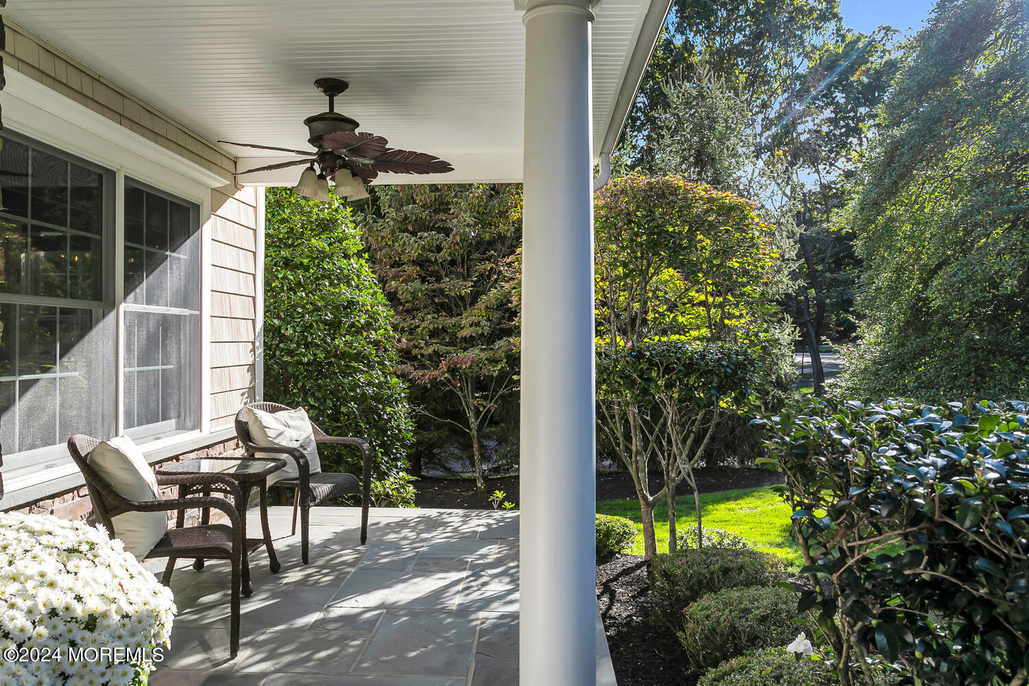 19 Old Phalanx Road Lincroft, NJ 07738 - Photo 4 of 68 a view of a porch with furniture and yard