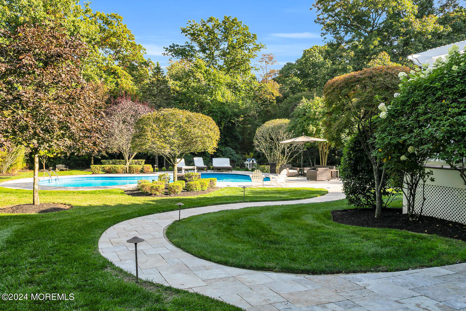 19 Old Phalanx Road Lincroft, NJ 07738 - Photo 48 of 68 a view of a swimming pool with a yard