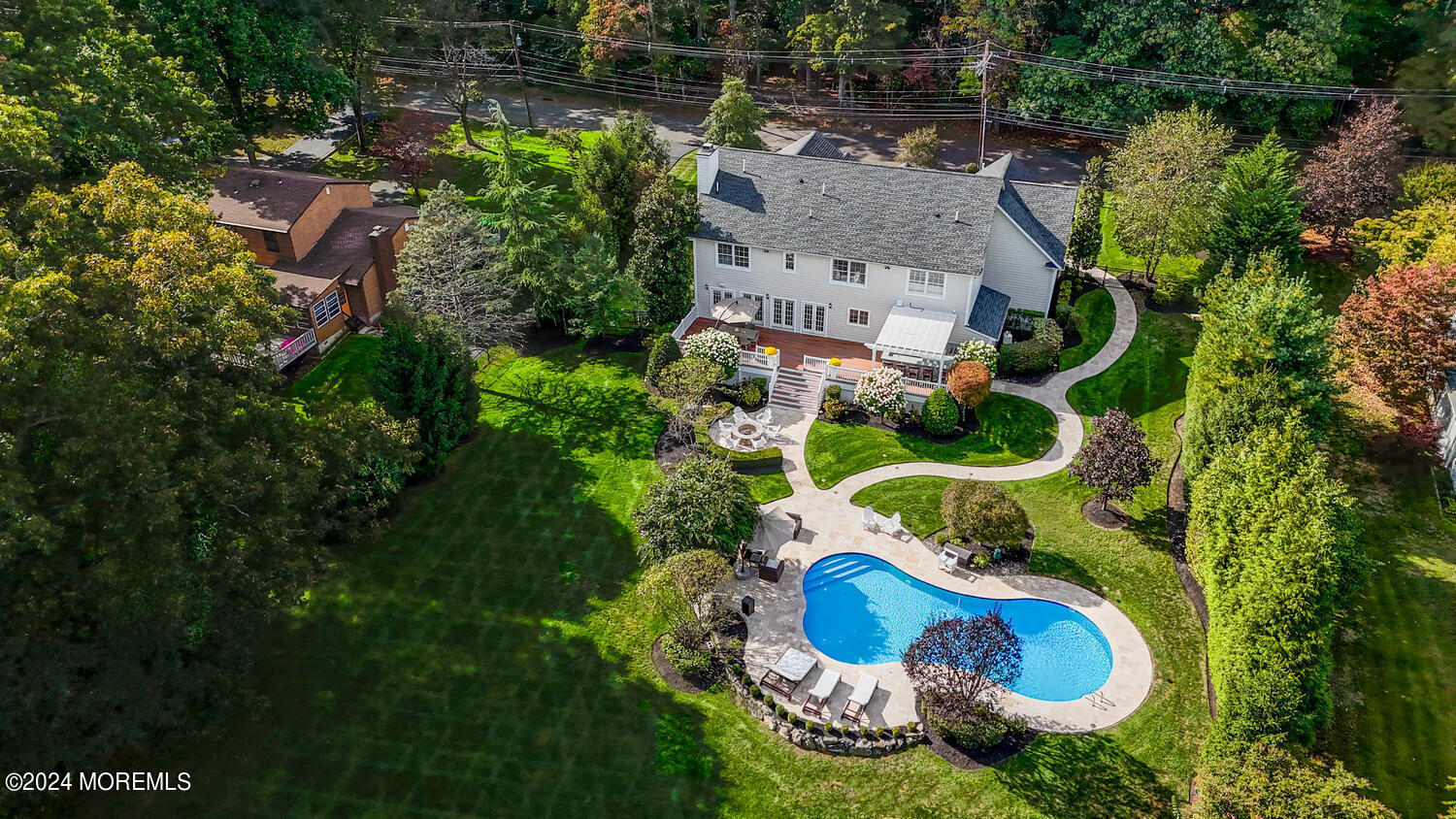 19 Old Phalanx Road Lincroft, NJ 07738 - Photo 60 of 68 an aerial view of residential house with outdoor space and swimming pool