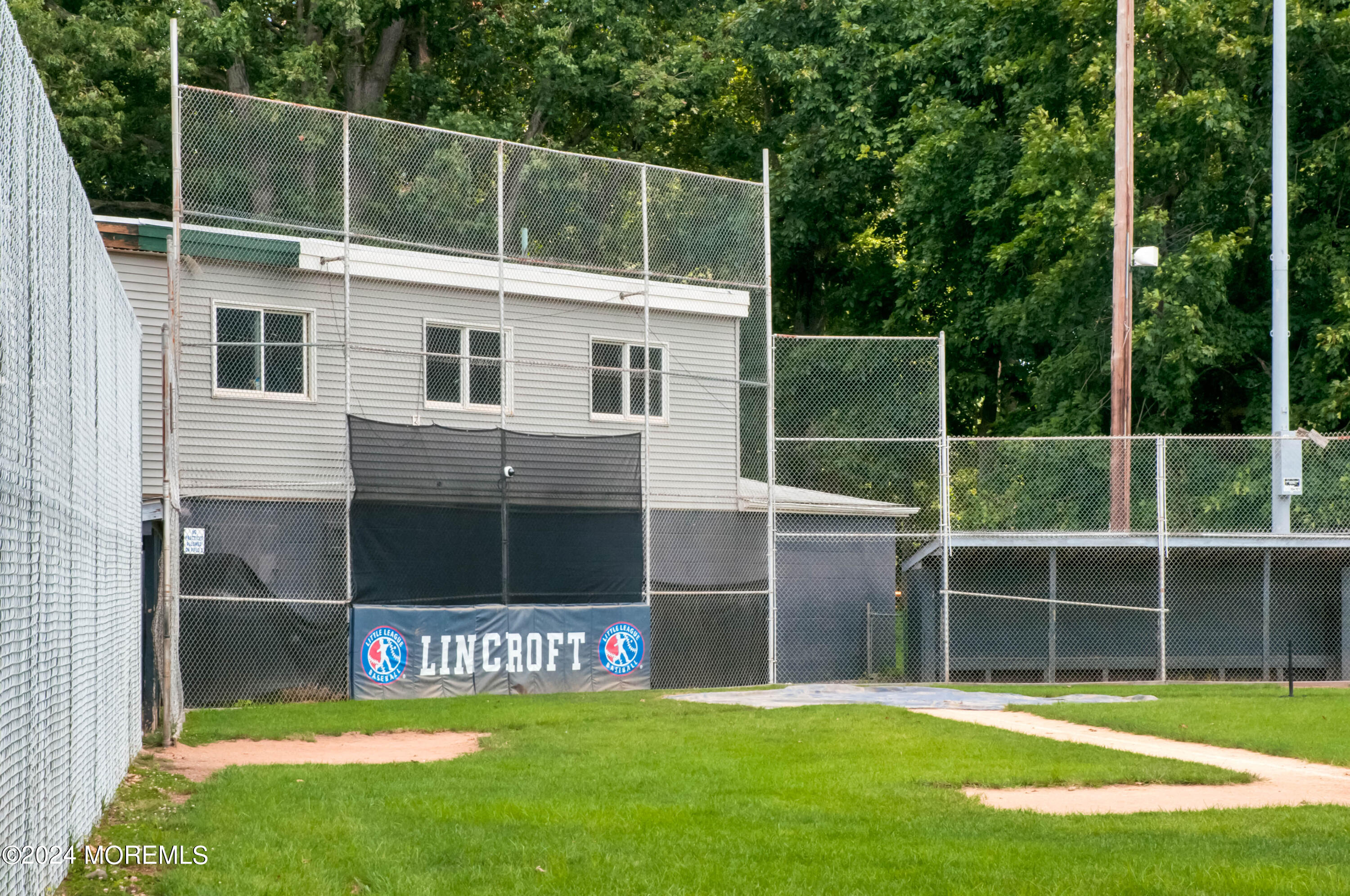 19 Old Phalanx Road Lincroft, NJ 07738 - Photo 67 of 68 a view of an house with backyard space and balcony