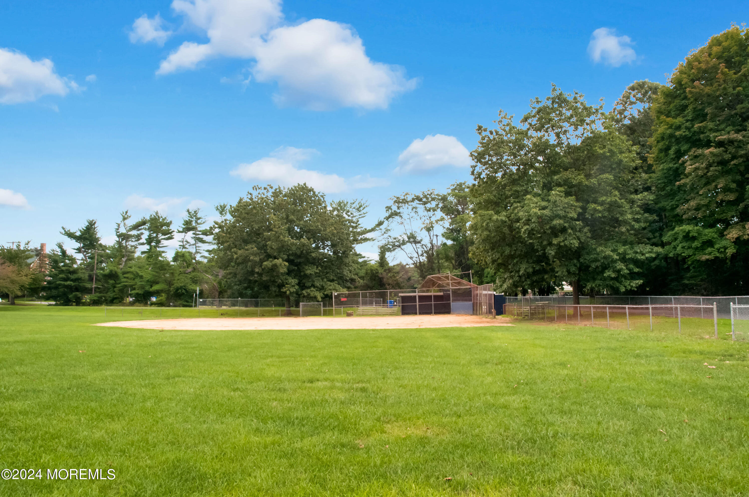 19 Old Phalanx Road Lincroft, NJ 07738 - Photo 68 of 68 a view of a swimming pool and a yard