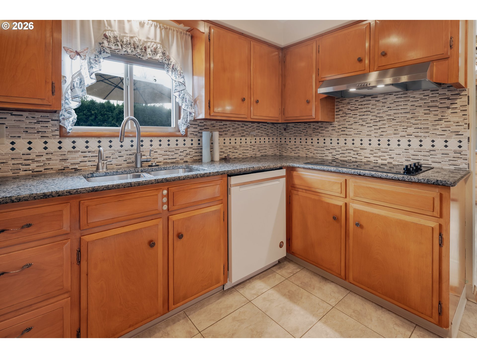 4290 Ivory Way Northeast Salem, OR 97305 - Photo 17 of 42 a kitchen with white cabinets and sink