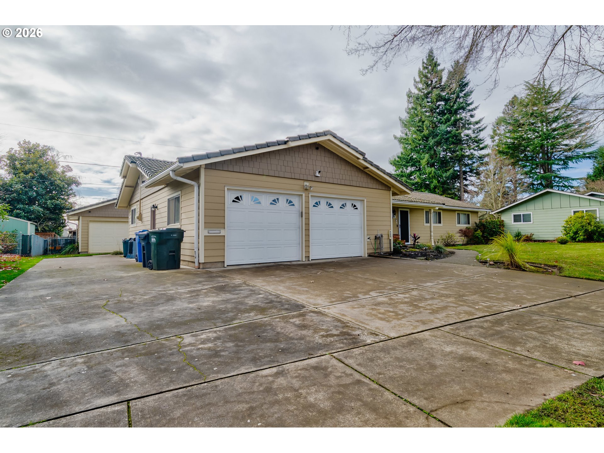 4290 Ivory Way Northeast Salem, OR 97305 - Photo 2 of 42 a view of a house with a yard and garage
