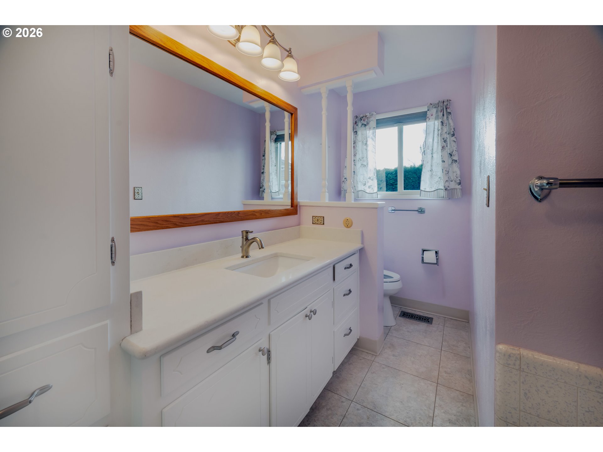 4290 Ivory Way Northeast Salem, OR 97305 - Photo 22 of 42 a bathroom with a sink mirror and a toilet