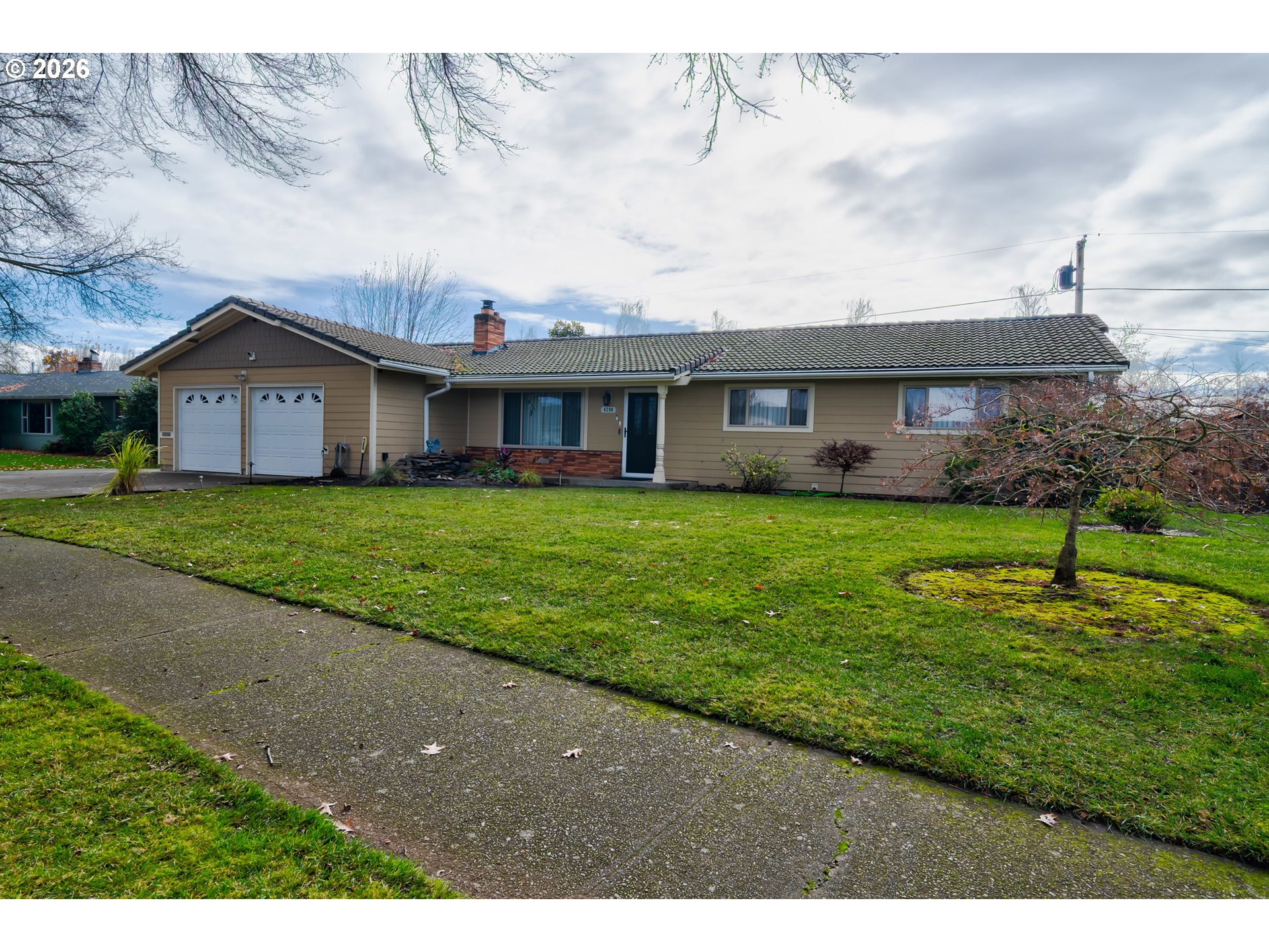 4290 Ivory Way Northeast Salem, OR 97305 - Photo 23 of 42 a view of a house with a yard and sitting area