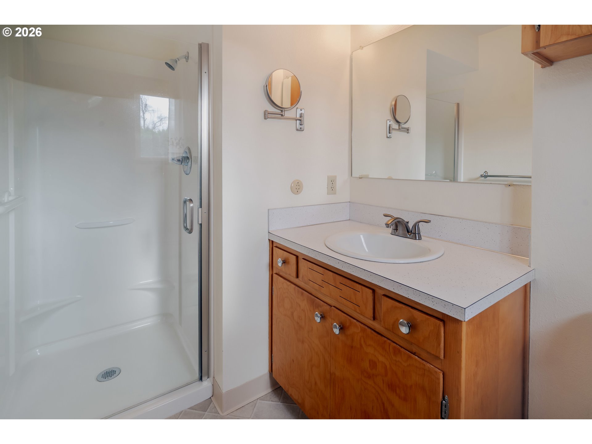 4290 Ivory Way Northeast Salem, OR 97305 - Photo 35 of 42 a bathroom with a sink shower and a mirror