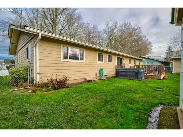 a picture of a room with a white wall and white cabinet