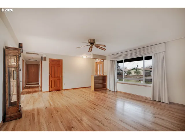 a kitchen with stainless steel appliances granite countertop a stove and cabinets