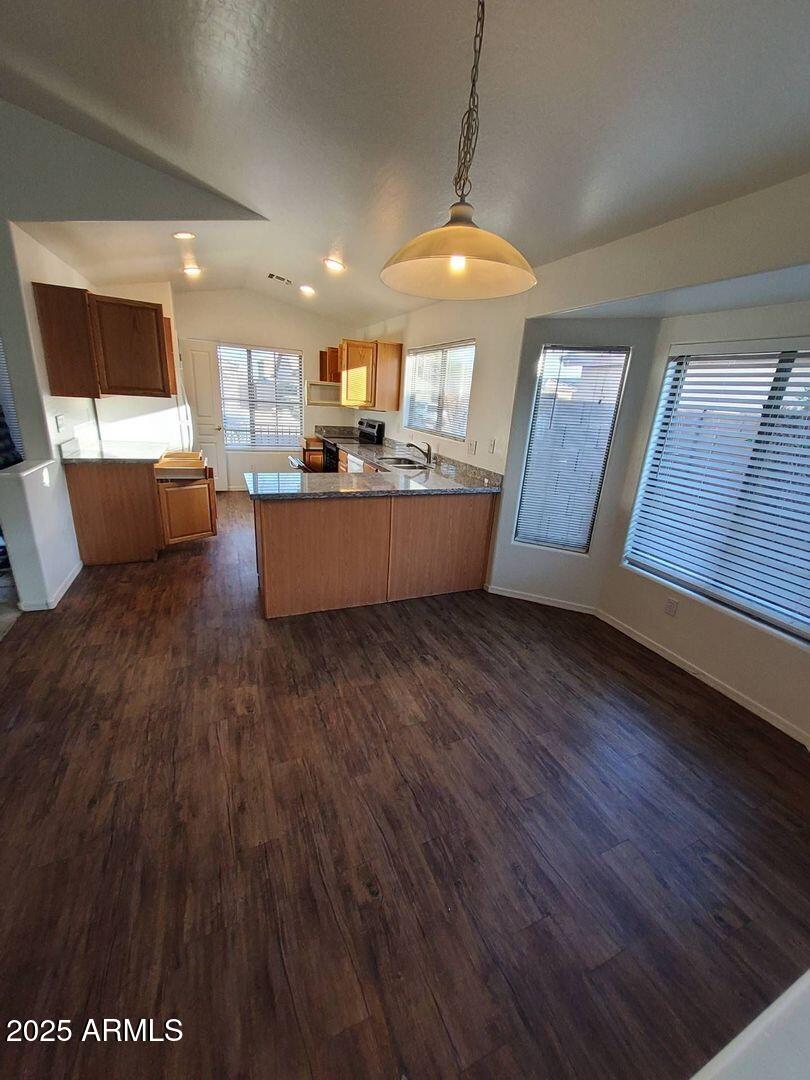 4335 West Carson Road Laveen, AZ 85339 - Photo 3 of 12 a room with wooden floors and pool table