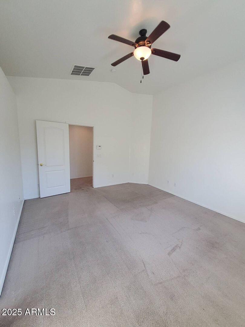4335 West Carson Road Laveen, AZ 85339 - Photo 7 of 12 a view of a big room with carpet