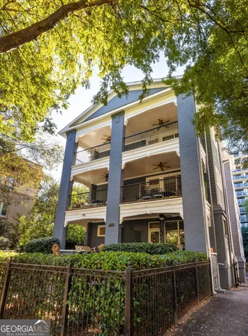 a front view of a building with balcony