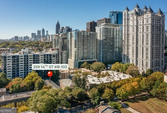a view of city with tall buildings