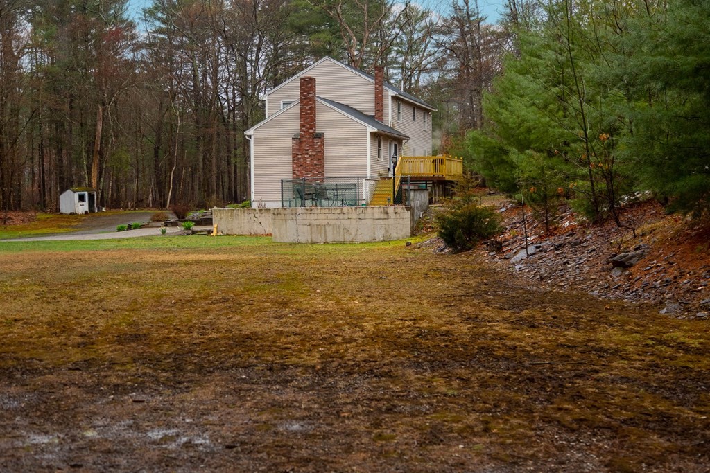 114 Leslie Road Rowley, MA 01969 - Photo 38 of 42 a view of a house with backyard and sitting area