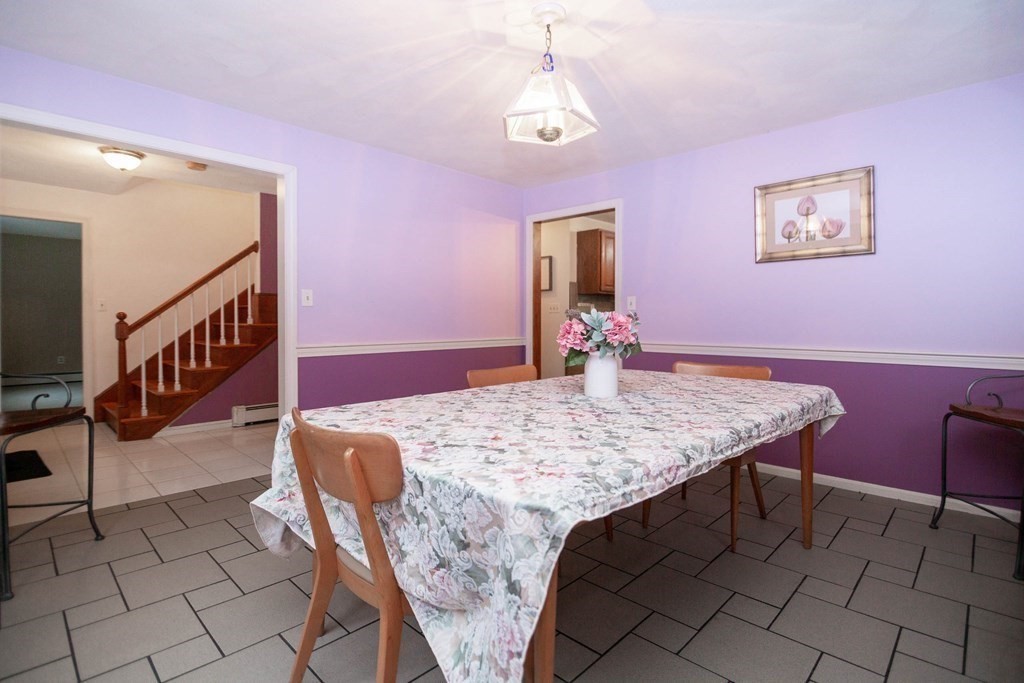 114 Leslie Road Rowley, MA 01969 - Photo 8 of 42 a dining room with table and chair