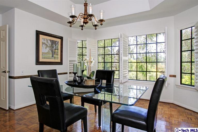 494 California Terrace Pasadena, CA 91105 - Photo 11 of 25 a view of a dining room with furniture window and wooden floor