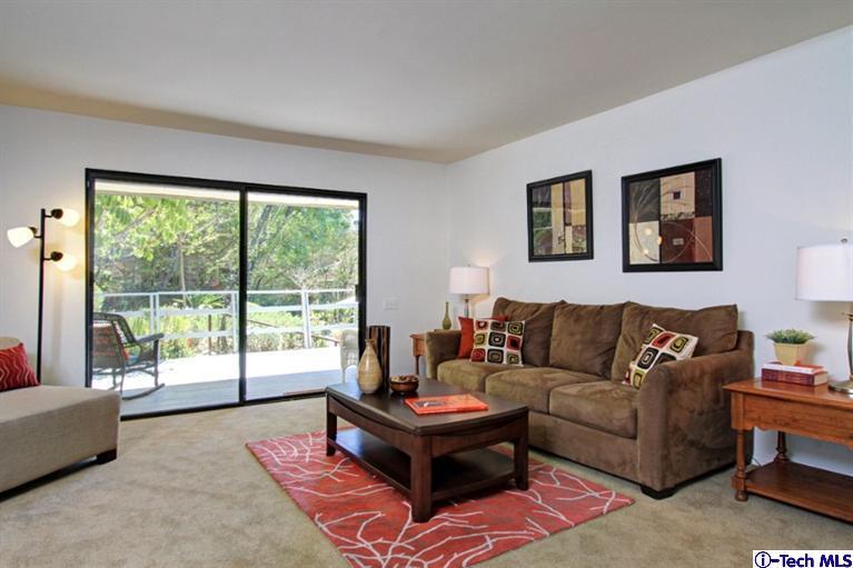 494 California Terrace Pasadena, CA 91105 - Photo 12 of 25 a living room with furniture and a large window