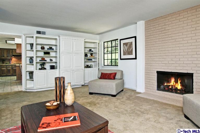 494 California Terrace Pasadena, CA 91105 - Photo 13 of 25 a living room with furniture and a fireplace