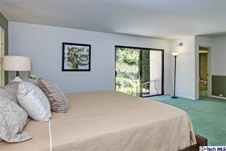 494 California Terrace Pasadena, CA 91105 - Photo 16 of 25 a bedroom with a bed and a window