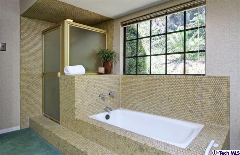 494 California Terrace Pasadena, CA 91105 - Photo 18 of 25 a bath tub sitting in a bathroom next to a window