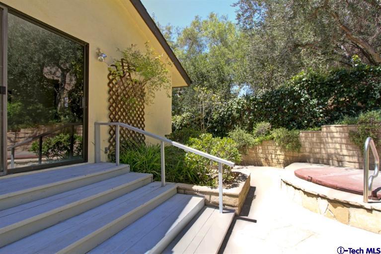 494 California Terrace Pasadena, CA 91105 - Photo 20 of 25 a balcony view with two chairs and a table