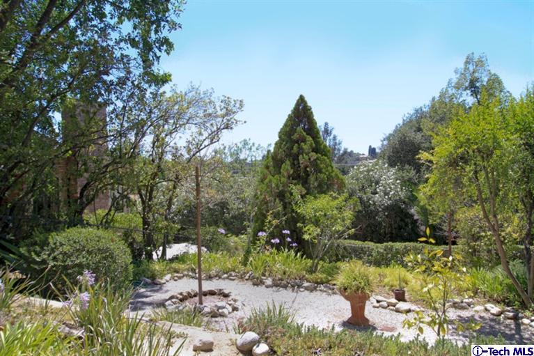 494 California Terrace Pasadena, CA 91105 - Photo 22 of 25 a view of a tree with a yard