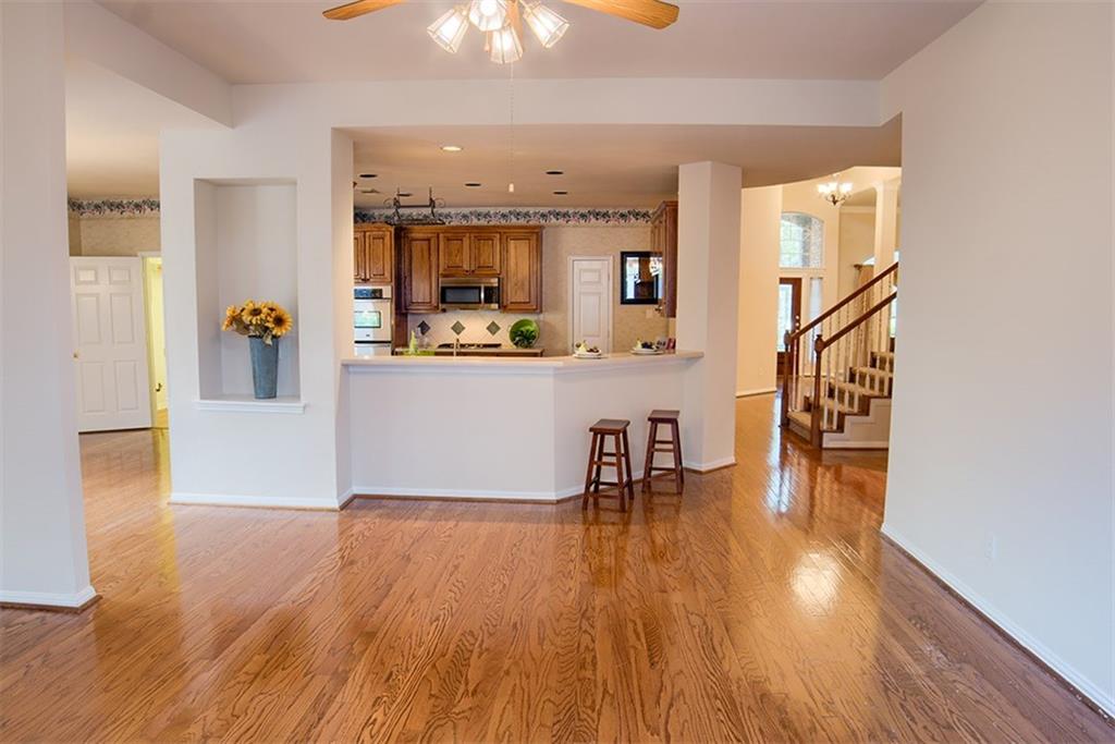 3404 Oxsheer Drive Austin, TX 78732 - Photo 10 of 15 a view of dining room with furniture and wooden floor