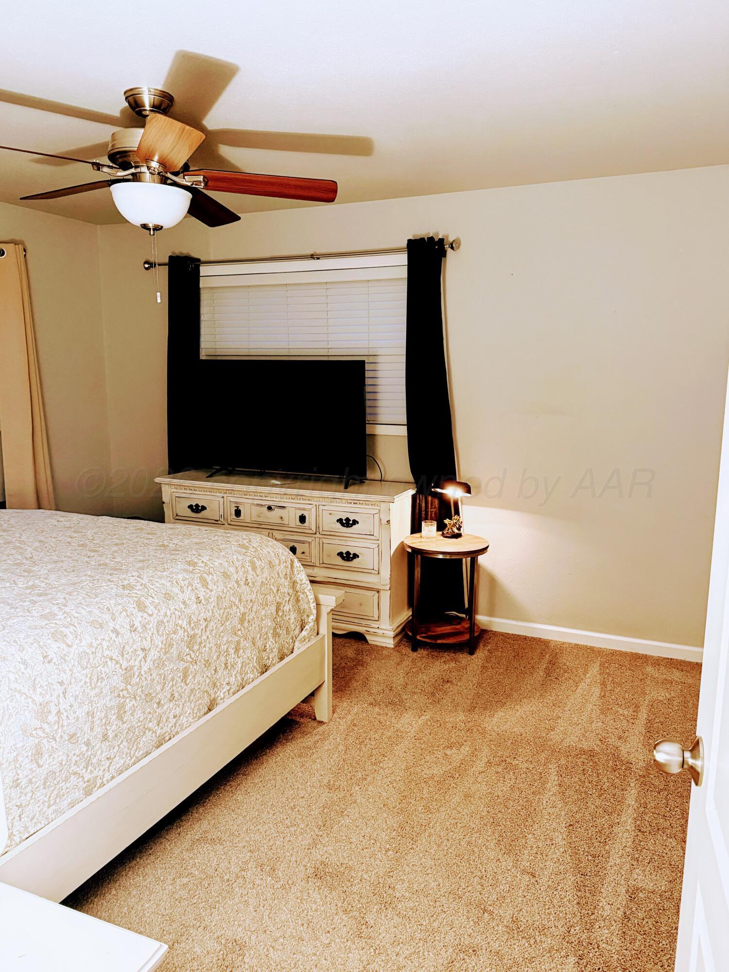 2105 Colgate Drive Perryton, TX 79070 - Photo 11 of 24 2105 Primary Bedroom