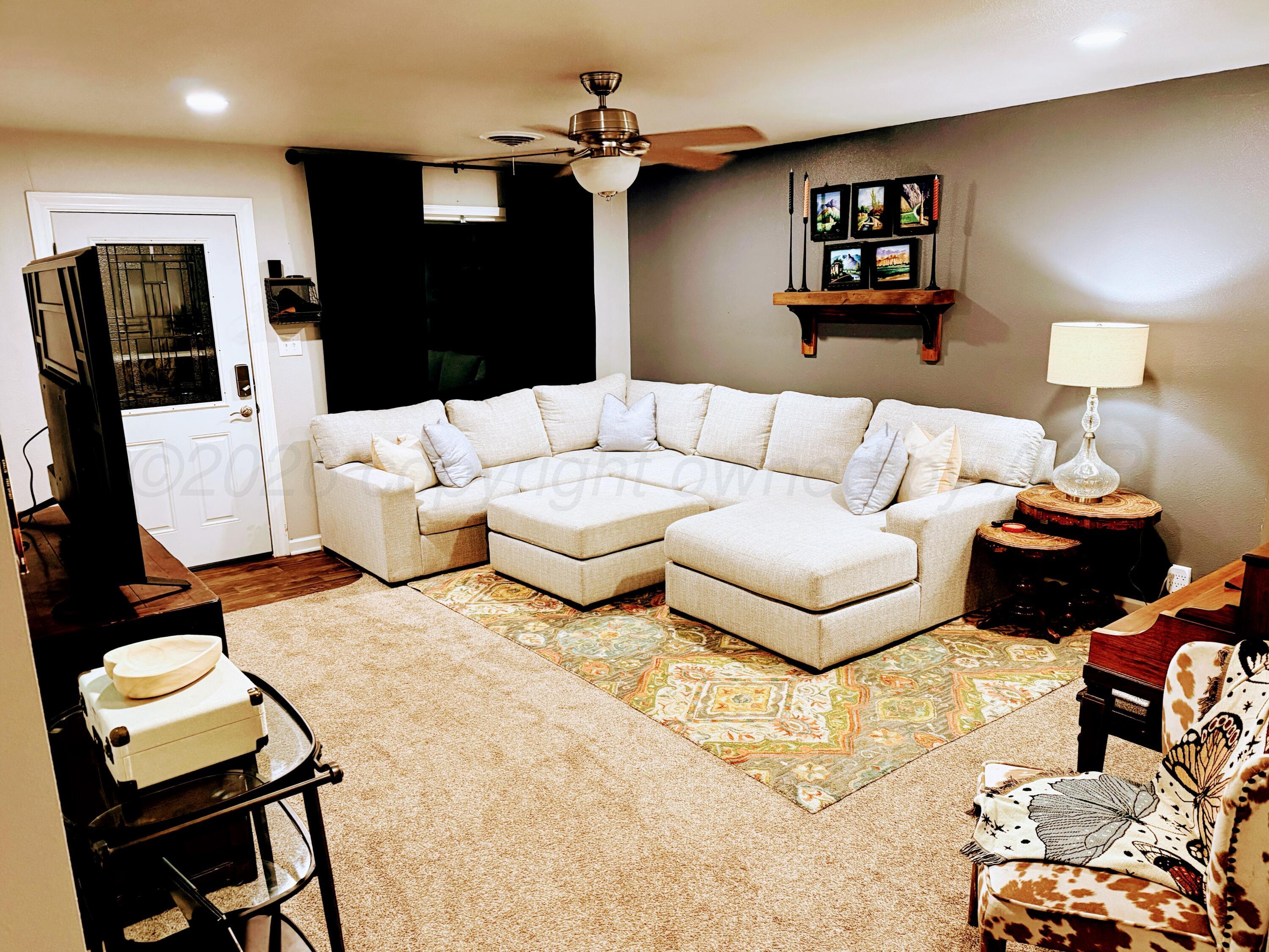 2105 Colgate Drive Perryton, TX 79070 - Photo 5 of 24 2105 Colgate Living Room 2