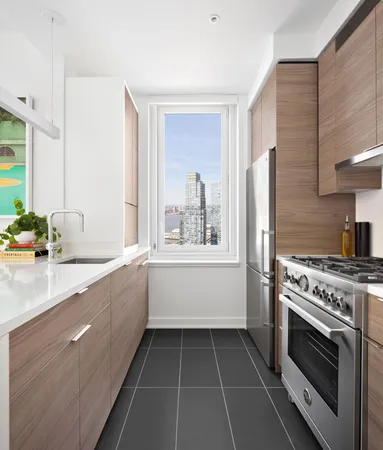 a kitchen with a stove and a sink