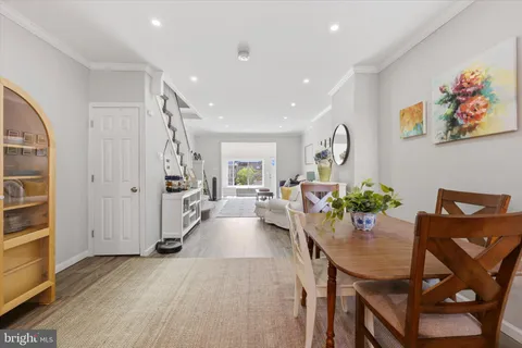a view of a living room and dining room