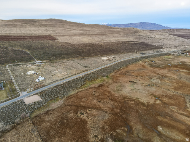 5952 South Lincoln Road Spanish Fork, UT 84660 - Photo 12 of 15 Aerial overview of property's location featuring a mountain backdrop and rural landscape