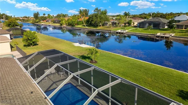 a view of a swimming pool with an outdoor seating