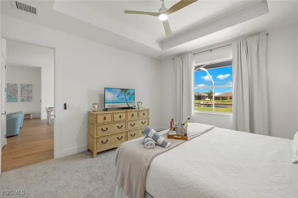 a bedroom with a bed and furniture