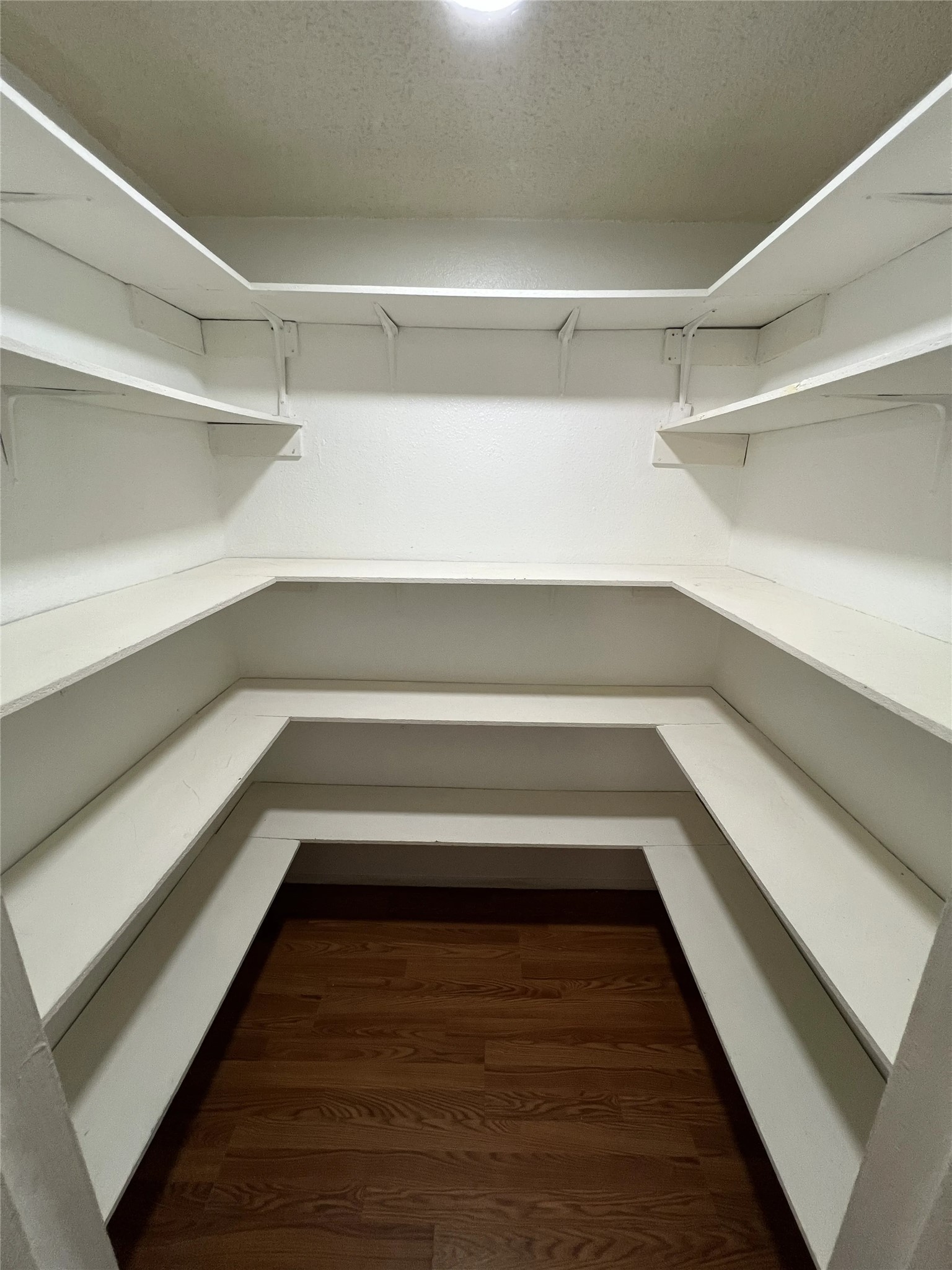 2500 Burleson Road, Unit 622 Austin, TX 78741 - Photo 8 of 17 Ample built-in shelving provides generous storage space in this organized pantry.