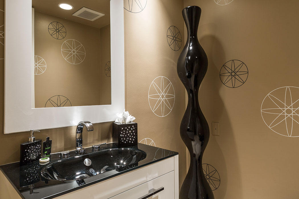 12 Avenida Andra Palm Desert, CA 92260 - Photo 34 of 42 a bathroom with a mirror and a sink