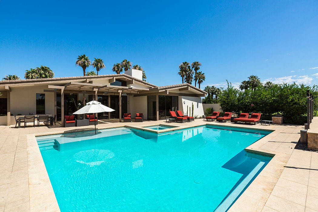 12 Avenida Andra Palm Desert, CA 92260 - Photo 5 of 42 a view of a swimming pool with lounge chair