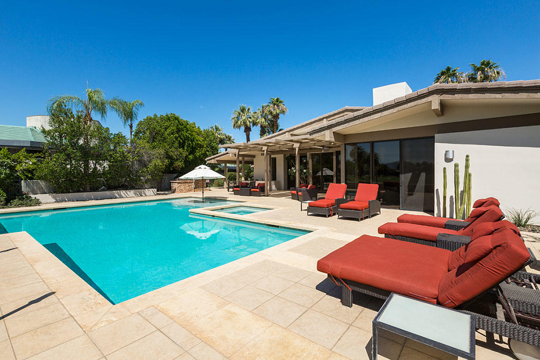 12 Avenida Andra Palm Desert, CA 92260 - Photo 10 of 42 a view of a patio with swimming pool and furniture