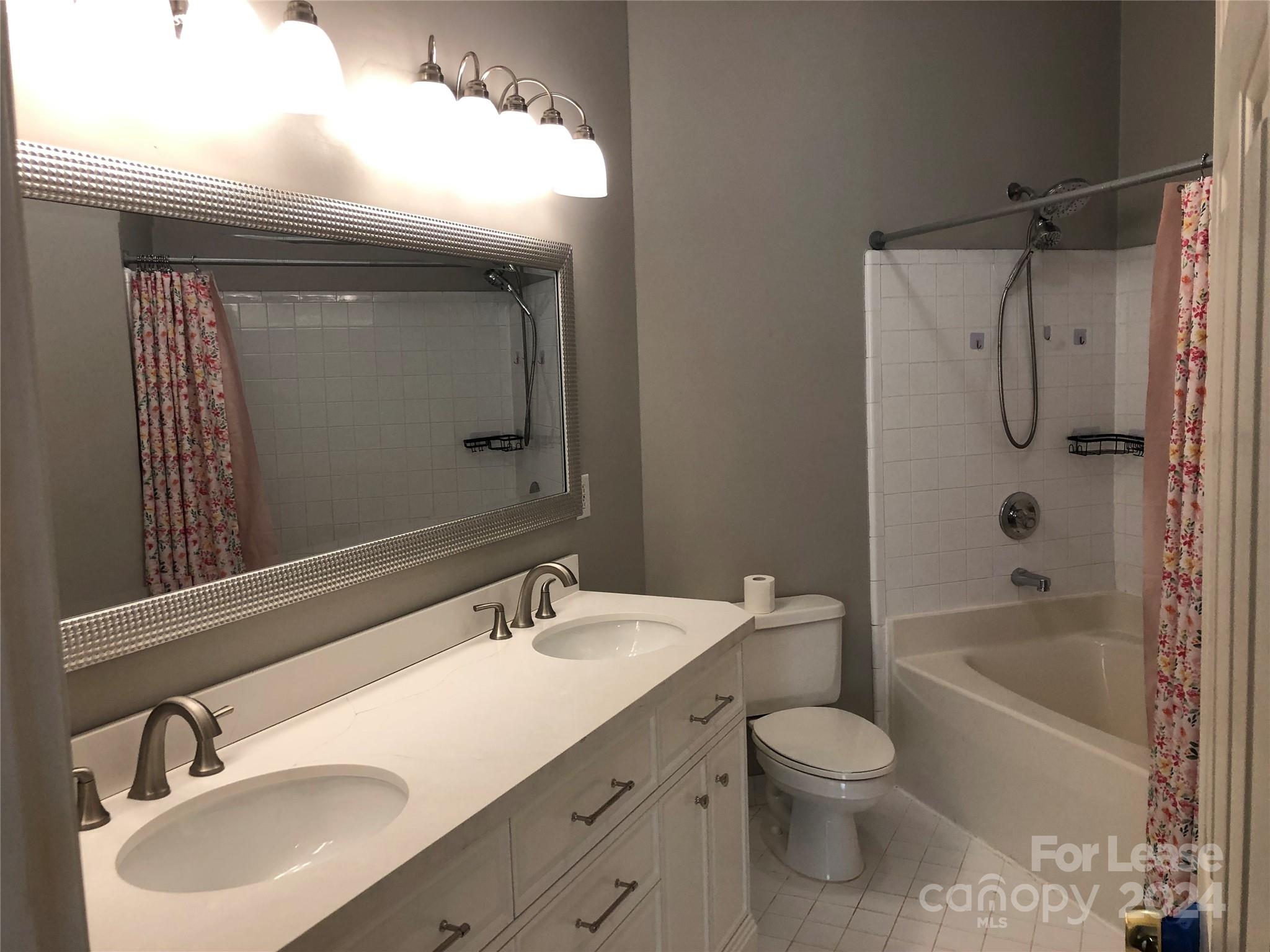 1328 Torrence Circle Davidson, NC 28036 - Photo 14 of 34 a bathroom with a sink toilet and shower