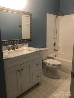 1328 Torrence Circle Davidson, NC 28036 - Photo 18 of 34 a bathroom with a granite countertop sink toilet a mirror and shower